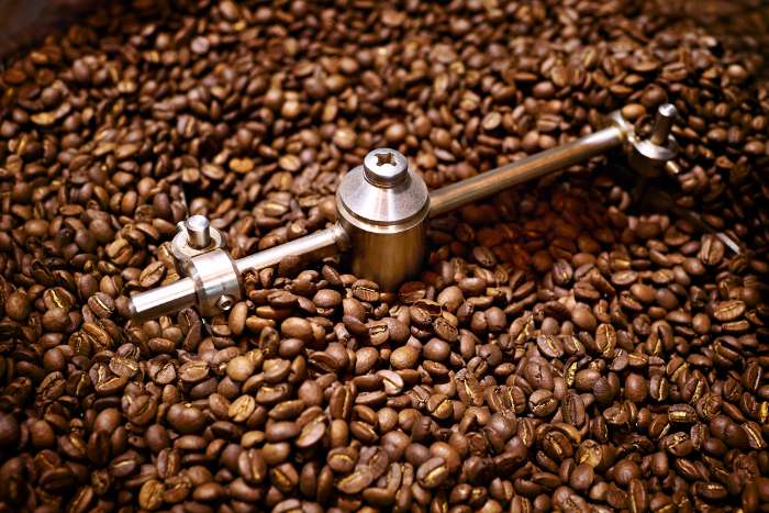 Nhà sản xuất / đóng gói cà phê |  Cận cảnh hạt cà phê mới rang